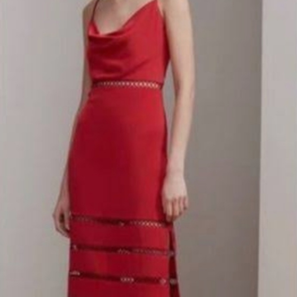 Beautiful red dress with side slits and perforated edges  Keepsake label